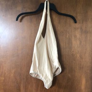 Nude American apparel halter body suit